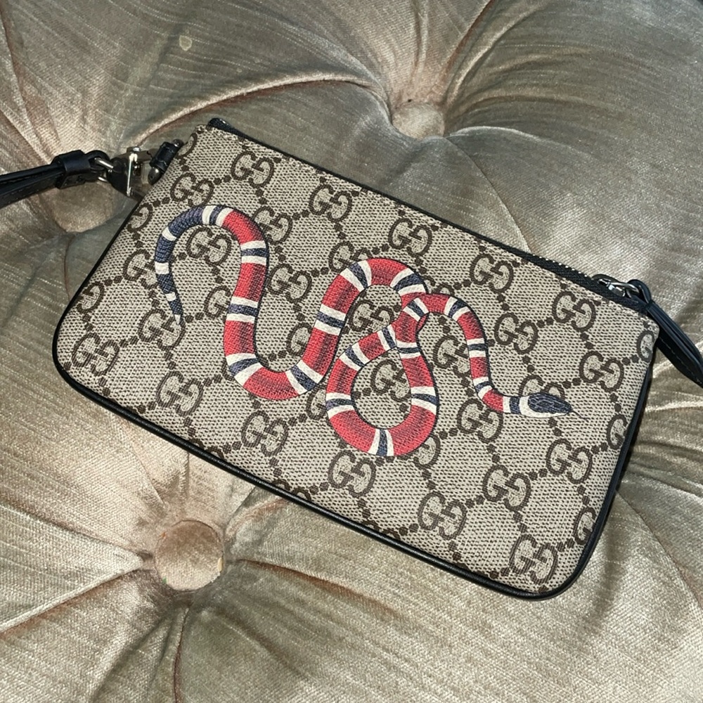 NWOT authentic Gucci snake print GG supreme pouch (unisex)